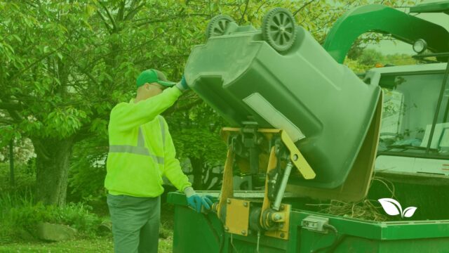 bin man emptying general waste bins